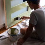 Real life Aussie bloke paints his front door during lockdown
