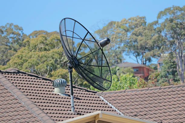 Mesh satellite dish on a house roof