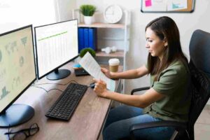 young-woman-sales-representative-going-through-work-papers-hispanic-business-manager-working-business-deal-from-home_11zon